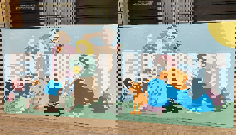 mural artwork of adults and children with a dog mural artwork of adults and children with a dog