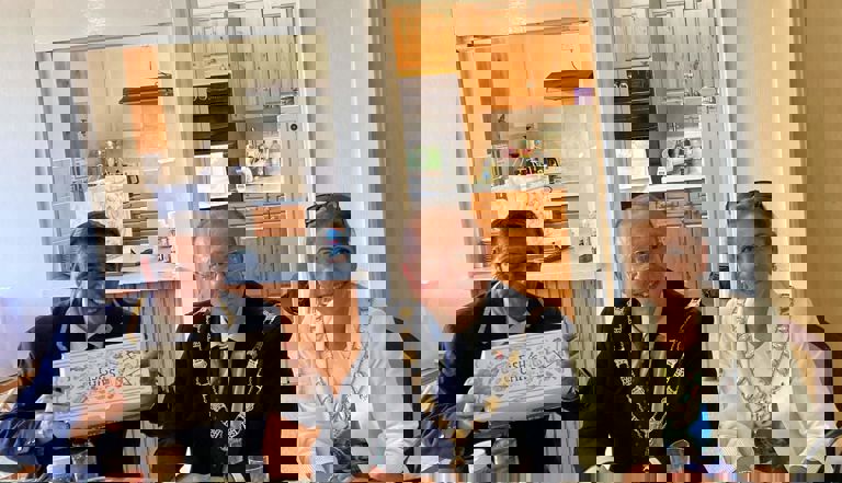 The mayor and mayoress eating in a independent living scheme fish and chips The mayor and mayoress eating in a independent living scheme fish and chips