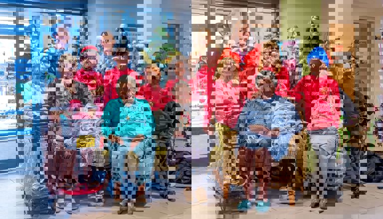 group of children from a choirs wearing red jerseys standing with older women group of children from a choirs wearing red jerseys standing with older women
