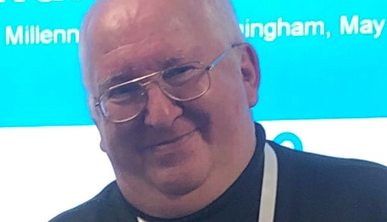 John Smiling wearing a black shirt John Smiling wearing a black shirt